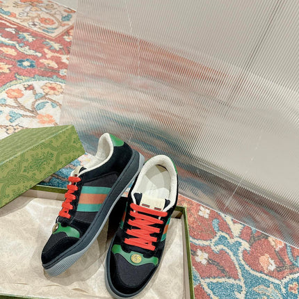 GUCCI 26S SCREENER SNEAKER IN BLACK SUEDE AND GREEN LEATHER