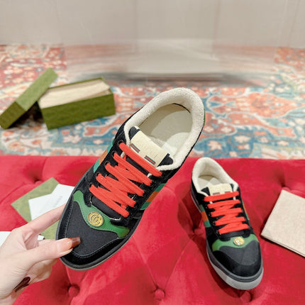 GUCCI 26S SCREENER SNEAKER IN BLACK SUEDE AND GREEN LEATHER