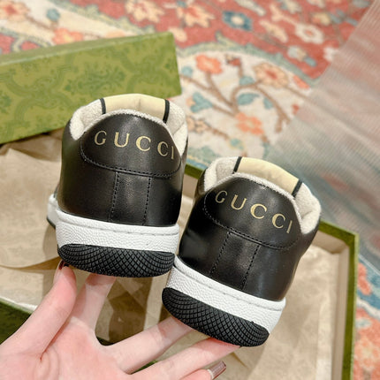 GUCCI 26S SCREENER SNEAKER IN BLACK AND WHITE LEATHER 