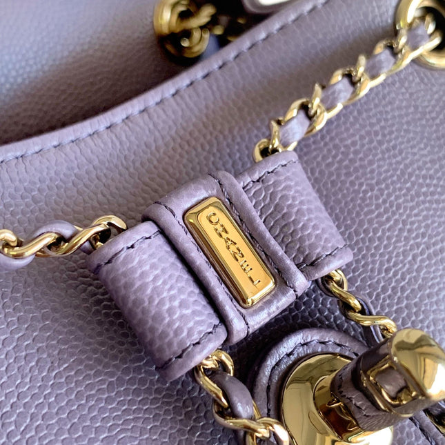 CHANEL 25S BACKPACK 17.5 CM IN PURPLE LAMBSKIN