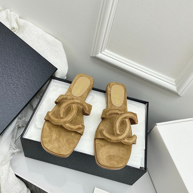 CHANEL CC LOGO MULES IN DARK BEIGE SUEDE