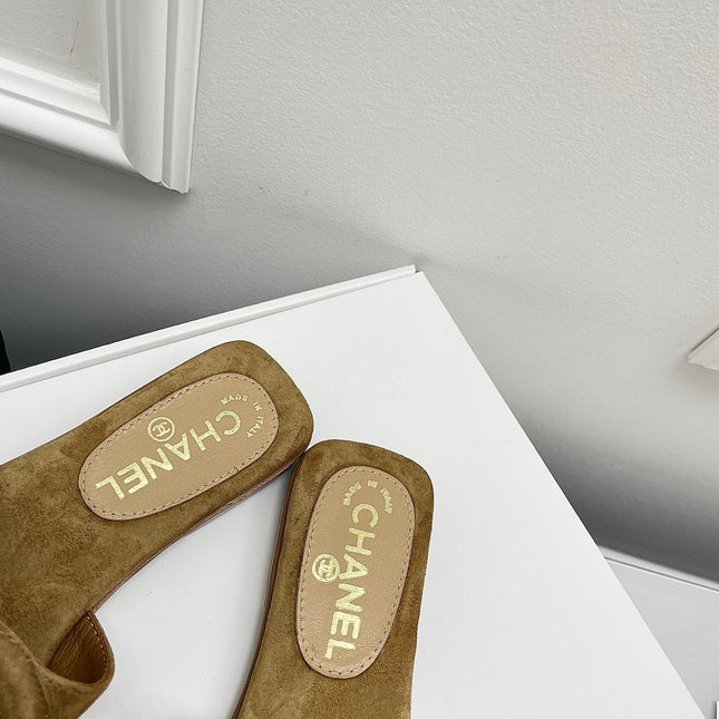 CHANEL CC LOGO MULES IN DARK BEIGE SUEDE