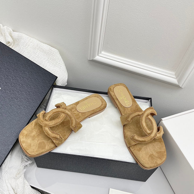 CHANEL CC LOGO MULES IN DARK BEIGE SUEDE