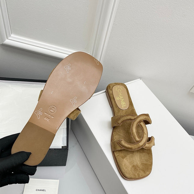 CHANEL CC LOGO MULES IN DARK BEIGE SUEDE
