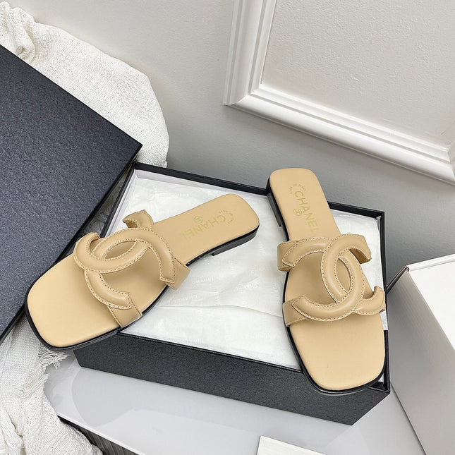CHANEL CC LOGO MULES IN BEIGE CALFSKIN