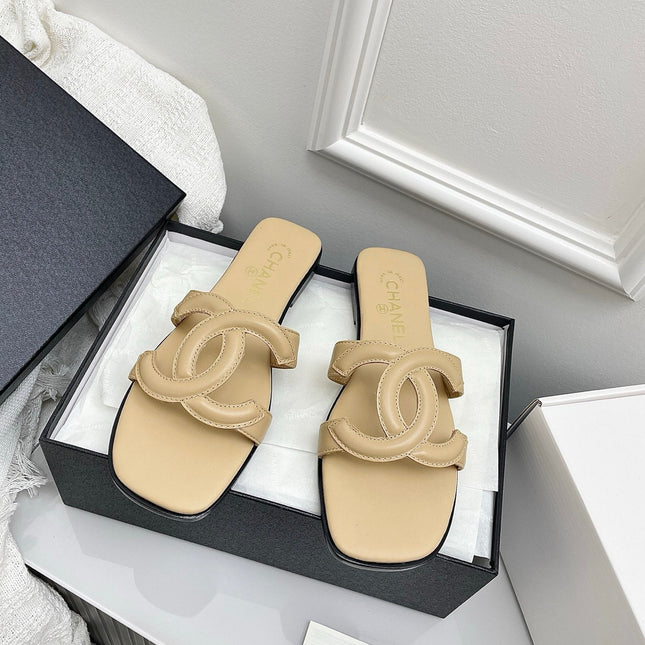 CHANEL CC LOGO MULES IN BEIGE CALFSKIN