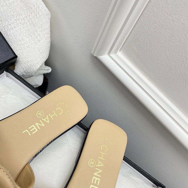 CHANEL CC LOGO MULES IN BEIGE CALFSKIN