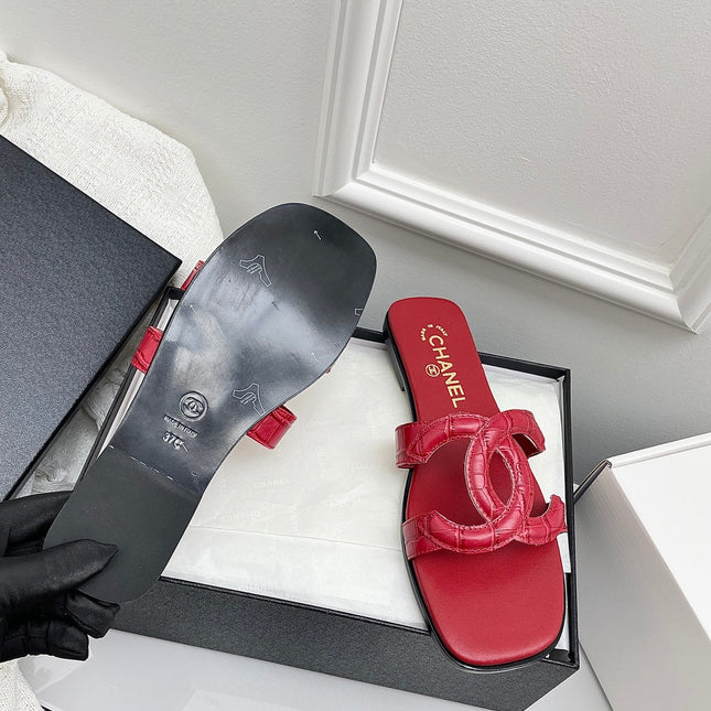 CHANEL CC LOGO MULES IN RED CALFSKIN