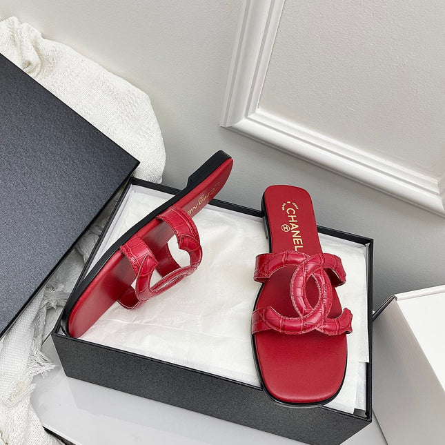 CHANEL CC LOGO MULES IN RED CALFSKIN