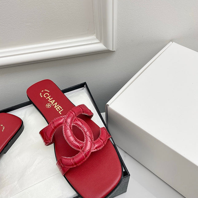 CHANEL CC LOGO MULES IN RED CALFSKIN