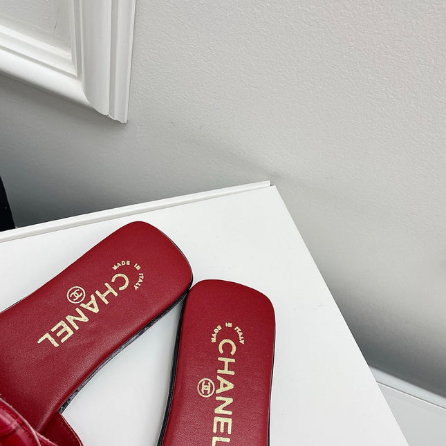 CHANEL CC LOGO MULES IN RED CALFSKIN