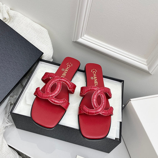 CHANEL CC LOGO MULES IN RED CALFSKIN