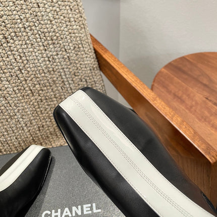 CHANEL 26S ANKLE BOOTS IN BLACK CALFSKIN WITH WHITE TRIM