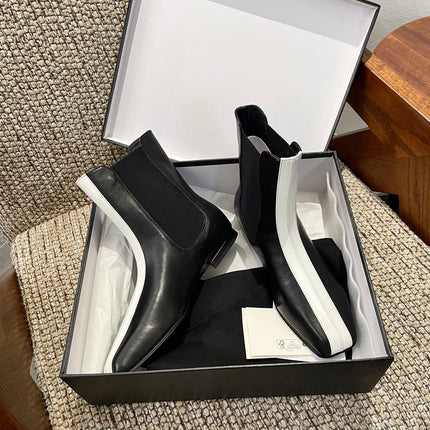 CHANEL 26S ANKLE BOOTS IN BLACK CALFSKIN WITH WHITE TRIM