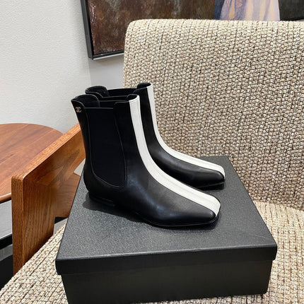CHANEL 26S ANKLE BOOTS IN BLACK CALFSKIN WITH WHITE TRIM