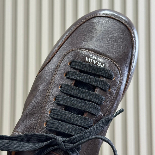 PRADA 25S COLLAPSE FLAT SHOES IN DARK BROWN CALFSKIN