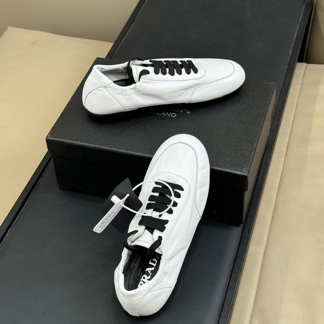 PRADA 25S COLLAPSE FLAT SHOES IN WHITE CALFSKIN