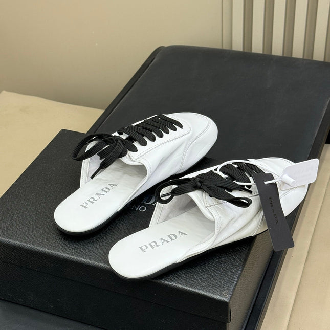 PRADA 25S COLLAPSE MULES IN WHITE CALFSKIN