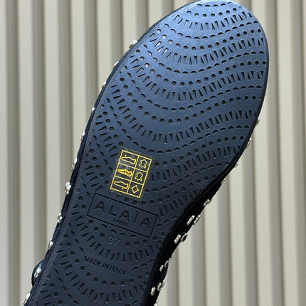 ALAIA 26S CROSS-STRAP FLATS IN BLACK SUEDE WITH SILVER HARDWARE