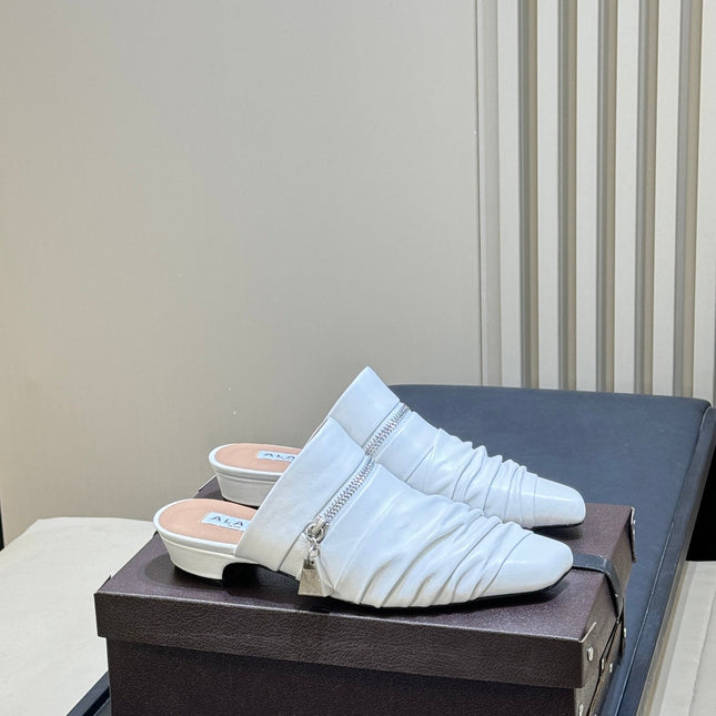 ALAIA 26S PLEATED MULES IN WHITE LAMBSKIN