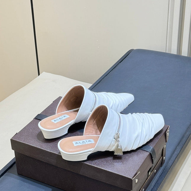 ALAIA 26S PLEATED MULES IN WHITE LAMBSKIN