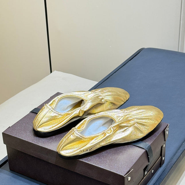 ALAIA 26S BALLET FLATS IN GOLD LAMBSKIN