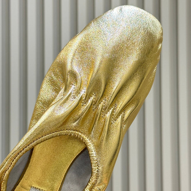 ALAIA 26S BALLET FLATS IN GOLD LAMBSKIN