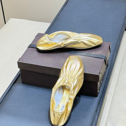 ALAIA 26S BALLET FLATS IN GOLD LAMBSKIN
