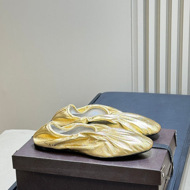ALAIA 26S BALLET FLATS IN GOLD LAMBSKIN