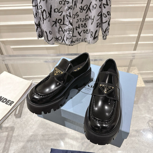 PRADA 26S PLATFORM LOAFERS 45MM IN BLACK SHINE CALFSKIN