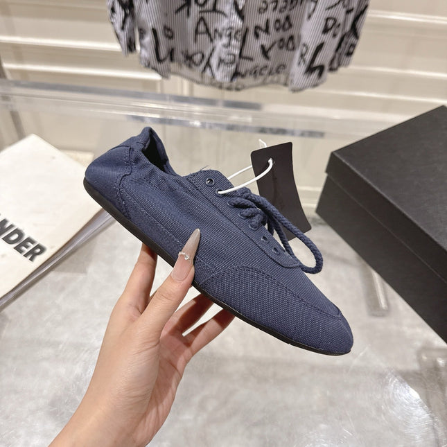 PRADA 26S COLLAPSE SNEAKERS IN BLUE CANVAS