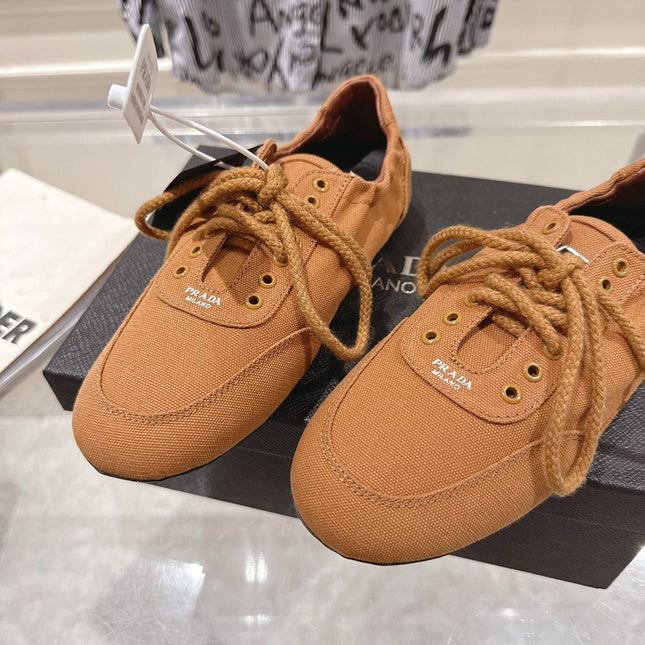 PRADA 26S COLLAPSE SNEAKERS IN CARAMEL BROWN CANVAS