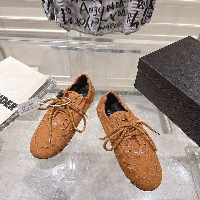 PRADA 26S COLLAPSE SNEAKERS IN CARAMEL BROWN CANVAS