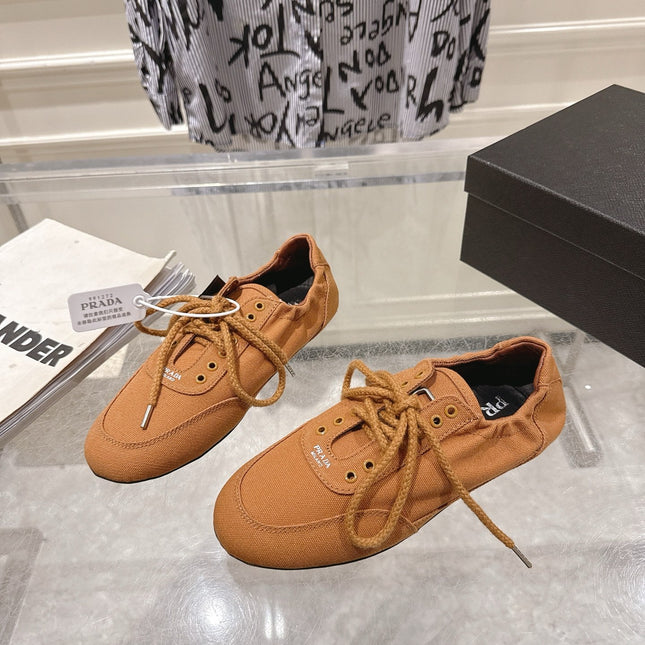 PRADA 26S COLLAPSE SNEAKERS IN CARAMEL BROWN CANVAS
