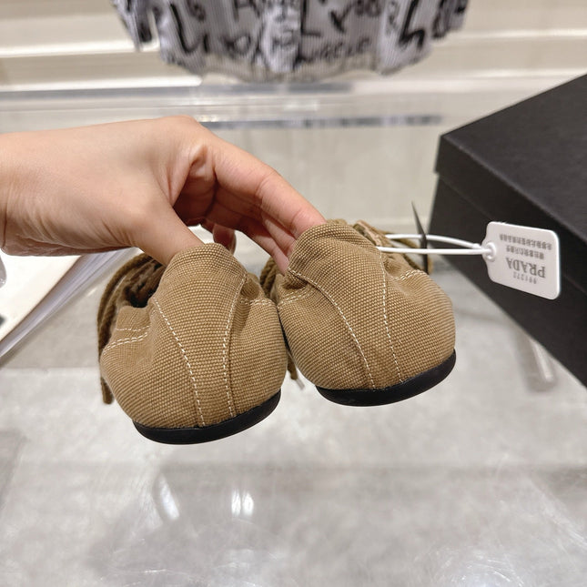 PRADA 26S COLLAPSE SNEAKERS IN BROWN CANVAS