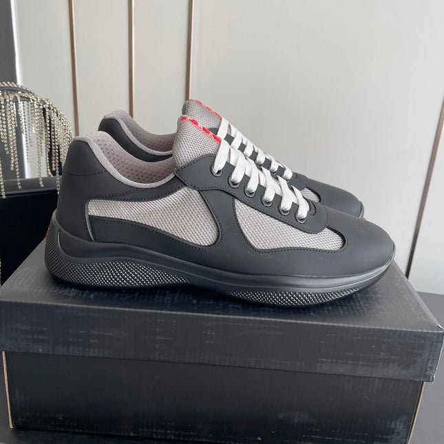 PRADA 26S AMERICA CUP SNEAKERS IN BLACK SOFT RUBBER AND BIKE FABRIC