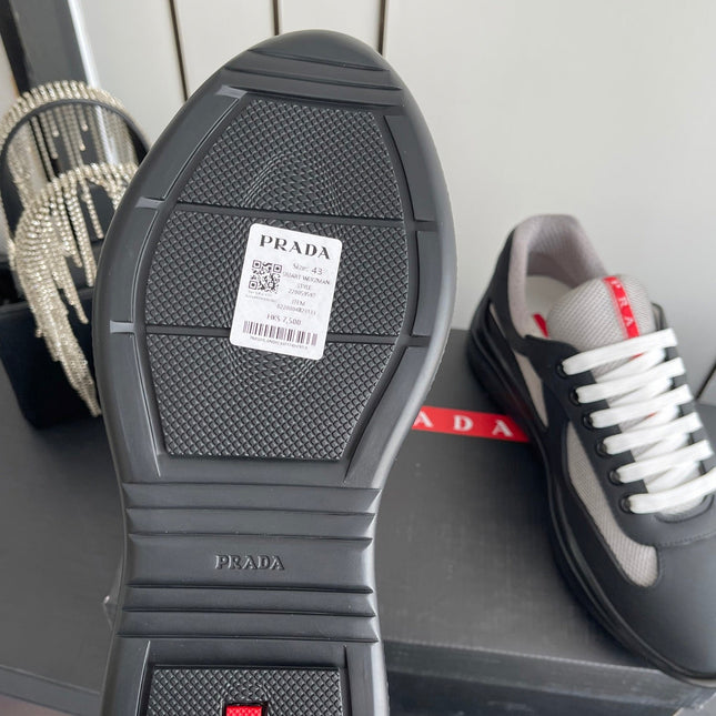 PRADA 26S AMERICA CUP SNEAKERS IN BLACK SOFT RUBBER AND BIKE FABRIC