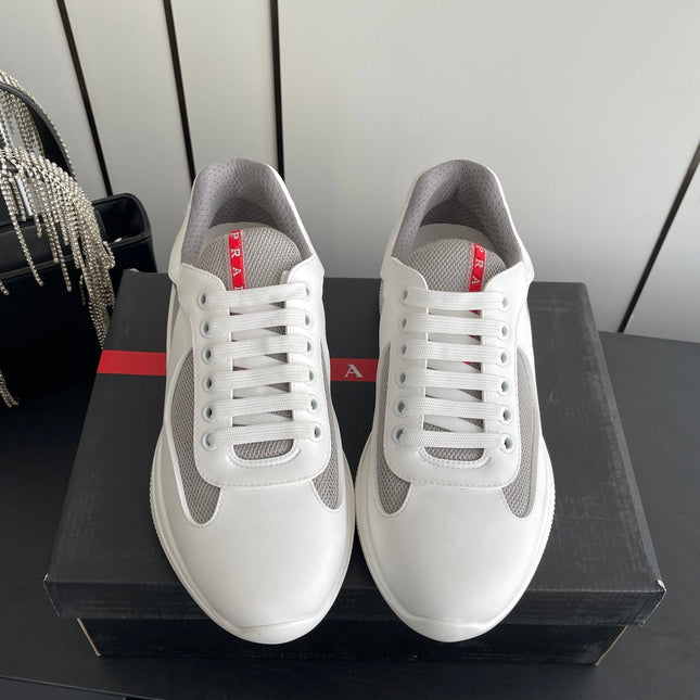 PRADA 26S AMERICA CUP SNEAKERS IN WHITE SOFT RUBBER AND BIKE FABRIC