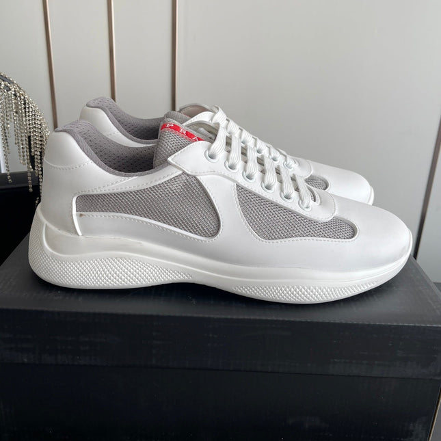 PRADA 26S AMERICA CUP SNEAKERS IN WHITE SOFT RUBBER AND BIKE FABRIC
