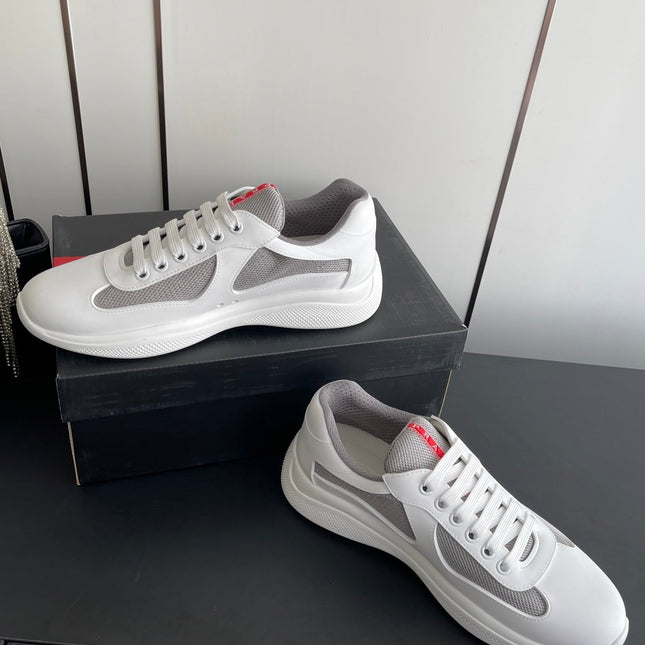 PRADA 26S AMERICA CUP SNEAKERS IN WHITE SOFT RUBBER AND BIKE FABRIC