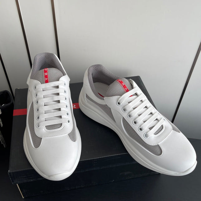 PRADA 26S AMERICA CUP SNEAKERS IN WHITE SOFT RUBBER AND BIKE FABRIC