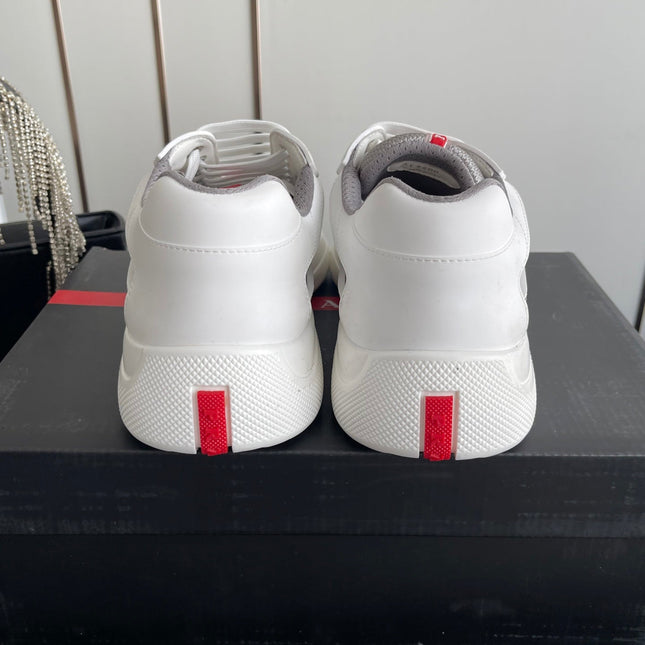 PRADA 26S AMERICA CUP SNEAKERS IN WHITE SOFT RUBBER AND BIKE FABRIC