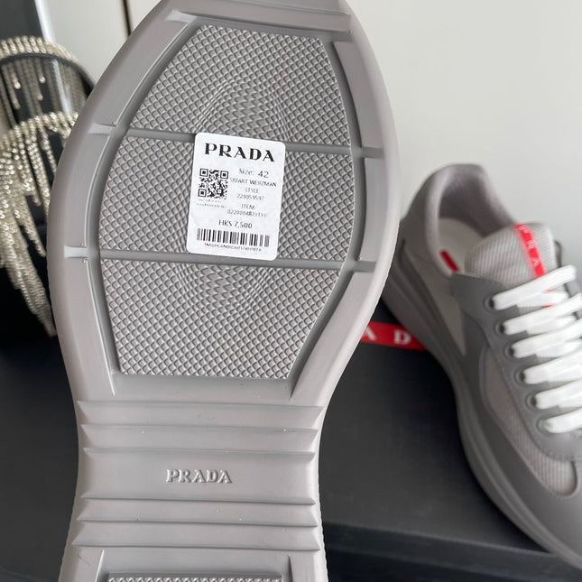 PRADA 26S AMERICA CUP SNEAKERS IN COOL GRAY SOFT RUBBER AND BIKE FABRIC
