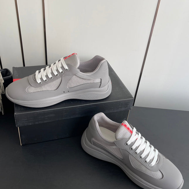 PRADA 26S AMERICA CUP SNEAKERS IN COOL GRAY SOFT RUBBER AND BIKE FABRIC