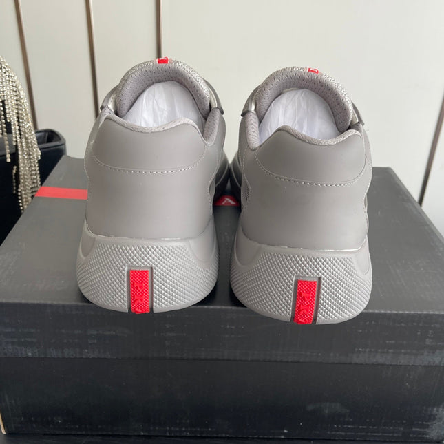 PRADA 26S AMERICA CUP SNEAKERS IN COOL GRAY SOFT RUBBER AND BIKE FABRIC