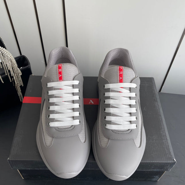 PRADA 26S AMERICA CUP SNEAKERS IN COOL GRAY SOFT RUBBER AND BIKE FABRIC