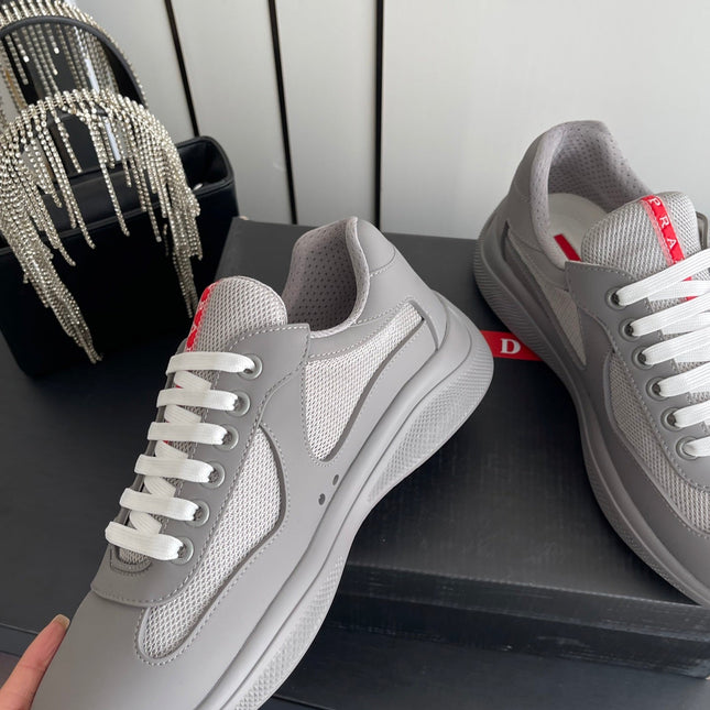 PRADA 26S AMERICA CUP SNEAKERS IN COOL GRAY SOFT RUBBER AND BIKE FABRIC