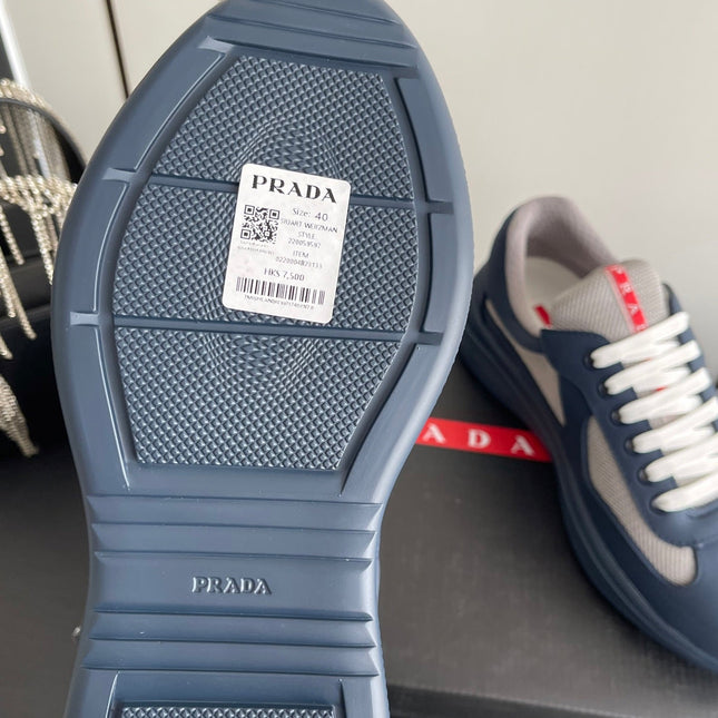 PRADA 26S AMERICA CUP SNEAKERS IN SLATE BLUE SOFT RUBBER AND BIKE FABRIC