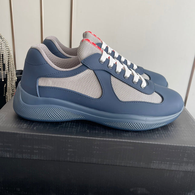 PRADA 26S AMERICA CUP SNEAKERS IN SLATE BLUE SOFT RUBBER AND BIKE FABRIC