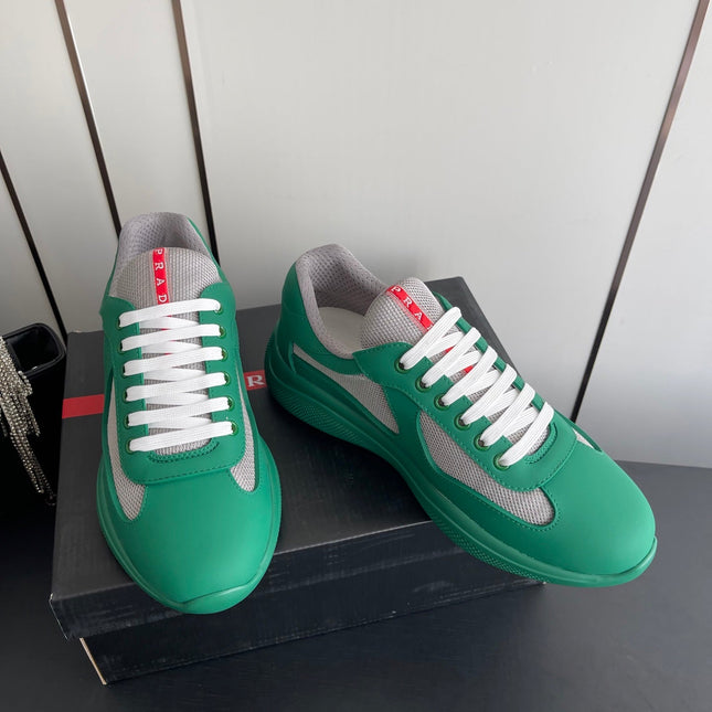 PRADA 26S AMERICA CUP SNEAKERS IN TEAL GREEN SOFT RUBBER AND BIKE FABRIC